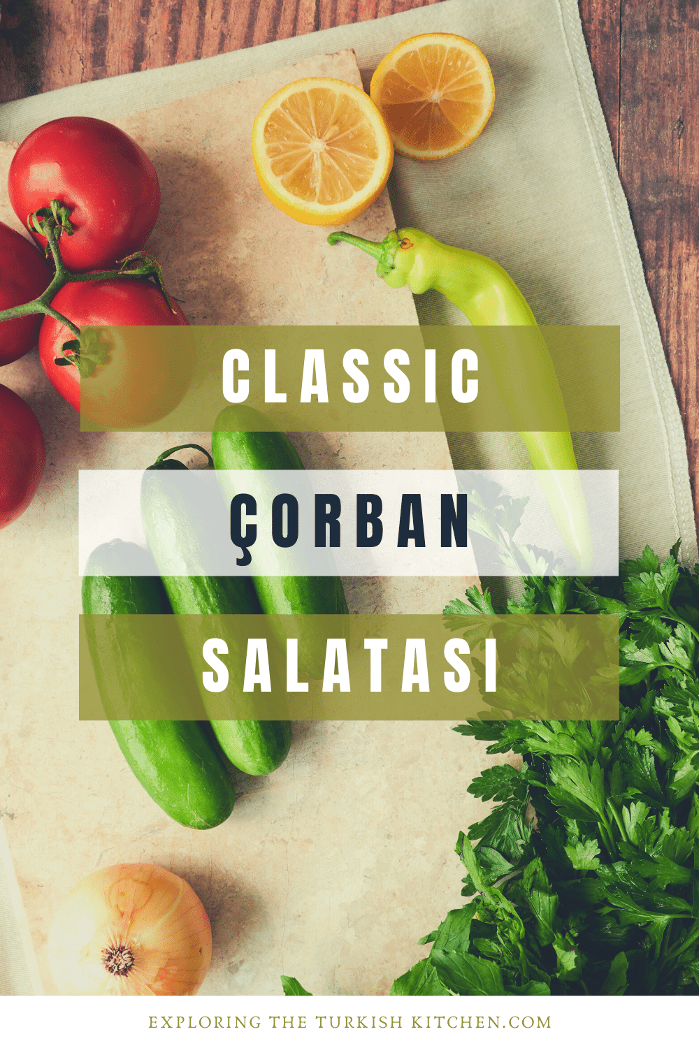 Pinable image for Turkish Shepherd Salad. The picture shows small cucumbers, tomatoes on the vine, Turkish pepper, whole onion and sliced lemon on a marble chopping board. The text overlay reads 'Classic Çorban Salatası. Exploring The Turkish Kitchen'..
