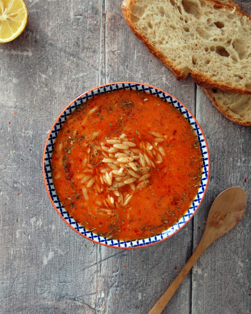 Turkish soup with orzo pasta grains, tomato and pepper şalça with Turkish sourdough bread and lemon dressing